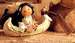 Friends of a Feather Minnesota Canoe with Indian Girl Figurine Friends of a Feather Minnesota Canoe with Indian Girl Figurine
- made of cold cast resin