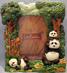 Beautiful Lou Rankin picture frames show the sculptors attention to detail. The picture frames freature beavers, bears and pandas in two dimensions surrounding the picture frame.