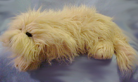 Lou Rankin Plush Zeus the Lhasa Apso Stuffed Animal Lou Rankin Plush Zeus the Lhasa Apso Stuffed Animal - Retired August 2001 "I come from the mounts of Tibet, with hair in my eyes and a beard to protect from the snow. But the only thing to protect from the cold is a friend to keep you warm."