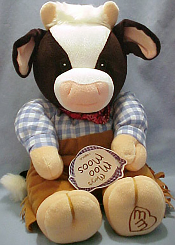 Mary's Moo Moos adorable plush cows are all dressed up in a plaid cowgirl dress and cowboy chaps with a plaid shirt.