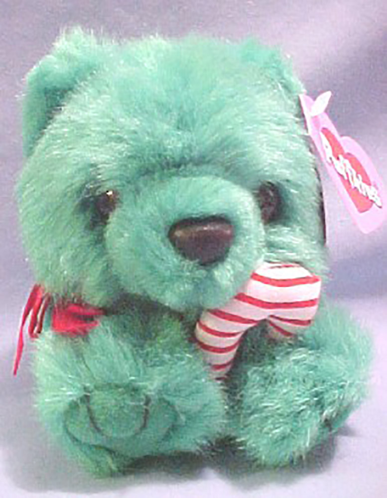 Puffkins Bean Bag Plush Jingles the Green Christmas Bear Puffkins Bean Bag Plush Jingles the Green Christmas Bear
- DOB 12/15/97
- Poem on Tag: "Jingles is a green bear with a treat just for you. He'll share his candy cane and his Christmas gifts too. There's nothing quite as nice as a hug from Jingles. On Christmas morning, his hug will give you tingles."
- Limited Edition Christmas 1998