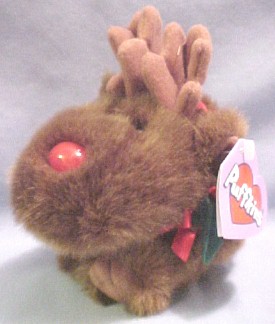 Puffkins Bean Bag Plush Mooseltoe the Christmas Moose Puffkins Bean Bag Plush Mooseltoe the Christmas Moose
- DOB 12/25/99
- Poem on Tag: "Dashing through the fine white snow, call out his name, 'Mooseltoe!' Like the beautiful mistletoe that grows, it's hard to miss a moose with a bright red nose!"
- Limited Edition Christmas 1999