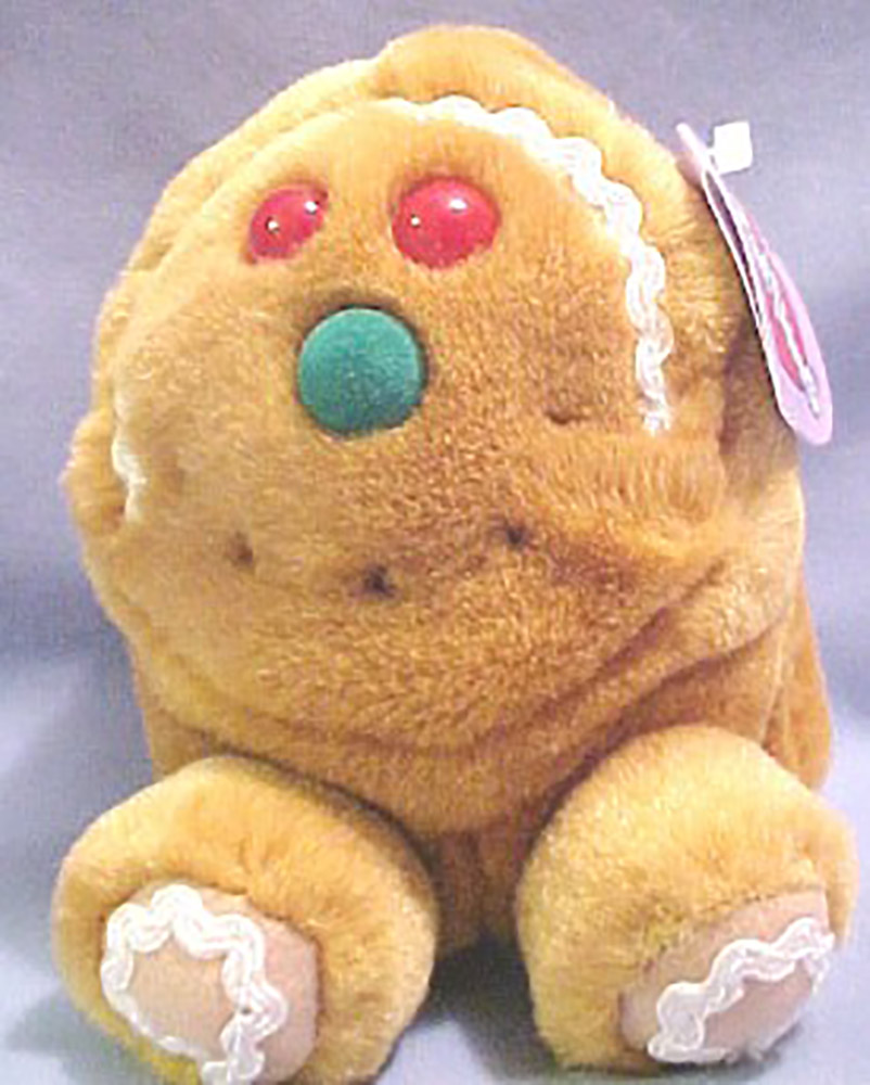 Puffkins Bean Bag Plush Spice the Gingerbread Man Puffkins Bean Bag Plush Spice the Gingerbread Man
- DOB 12/25/99
- Poem on Tag: "Spice spreads holiday cheer like icing with his warm gingerbread scent so enticing. Tickle his toes and he'll giggle with glee, nibble his nose and he'll laugh merrily!"
- Limited Edition Christmas 1999