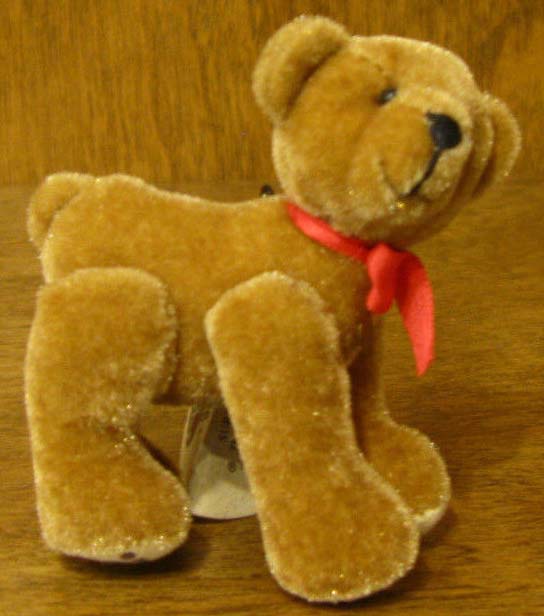 Ganz Cottage Collectibles Miniatures Miguel Teddy Bear with Red Ribbon Ganz Cottage Collectibles Miniatures Miguel Teddy Bear with Red Ribbon
- introduced in 1998 and has been retired
- designed by Lynda Kunz
- fully jointed plush Teddy Bear