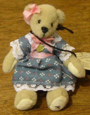 Ganz Cottage Collectibles Miniatures Claira Teddy Bear in Blue Dress Ganz Cottage Collectibles Miniatures Claira Teddy Bear in Blue Dress
- introduced in 1996 and has been retired
- designed by Lynda Kunz
- fully jointed plush Teddy Bear