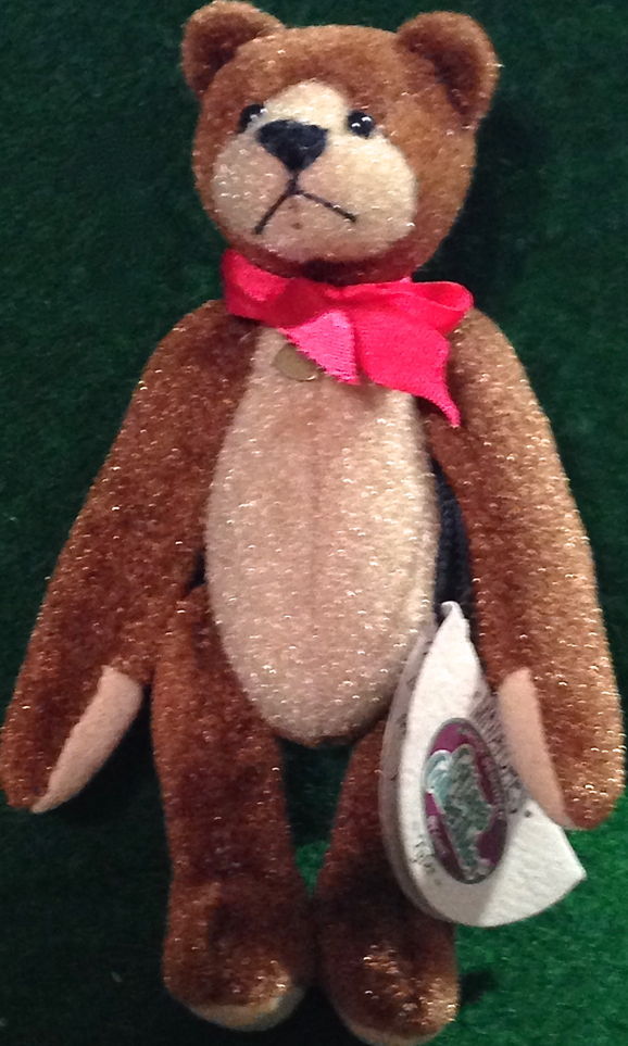 Ganz Cottage Collectibles Miniatures Tyler the Brown and Tan Teddy Bear Ganz Cottage Collectibles Miniatures Tyler the Brown and Tan Teddy Bear
- introduced in 1999 and has been retired
- designed by Mary Holstad
- fully jointed plush Teddy Bear