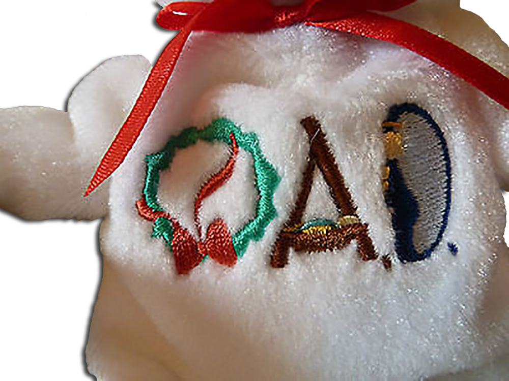 Close up of embroidery on the Holy Bear Miracle The Christmas Teddy Bear Close up of embroidery on the Holy Bear Miracle The Christmas Teddy Bear