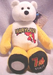 Maryland State Quarter Teddy Bear Maryland State Quarter Teddy Bear
- Coin Facts on Tag: "The Maryland quarter depicts Maryland's Statehouse which from 1783-1784, served as the nation's first peacetime capital. The Treaty of Paris was ratified there, officially ending the Revolutionary War. Leaf clusters from the official state tree, the White Oak, and the nickname 'The Old Line State' in honor of Maryland's Revolutionary War 'troops of the line', completes the design."
- Other information on Tag: State Flower: Black-Eyed Susan; State Bird: Baltimore Oriole; Nickname: Old Line State; Capital: Annapolis; Statehood: April 28, 1788