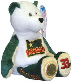 Oregon State Quarter Teddy Bear Oregon State Quarter Teddy Bear
- Coin Facts on Tag: "The Oregon coin is the 33rd to be released in the U.S. Mint's 50 State Quarter program. It features a portion of Crater Lake, the deepest lake in the United States, viewed from the south-southwest rim. The nature inspired design also includes Wizard Island, tall conifer trees and Watchman and Hillman Peaks bordering the lake."
- Other information on Tag: State Flower: Oregon Grape; State Bird: Western Meadow Lark; Nickname: Beaver State; Capital: Salem; Statehood: February 14, 1859