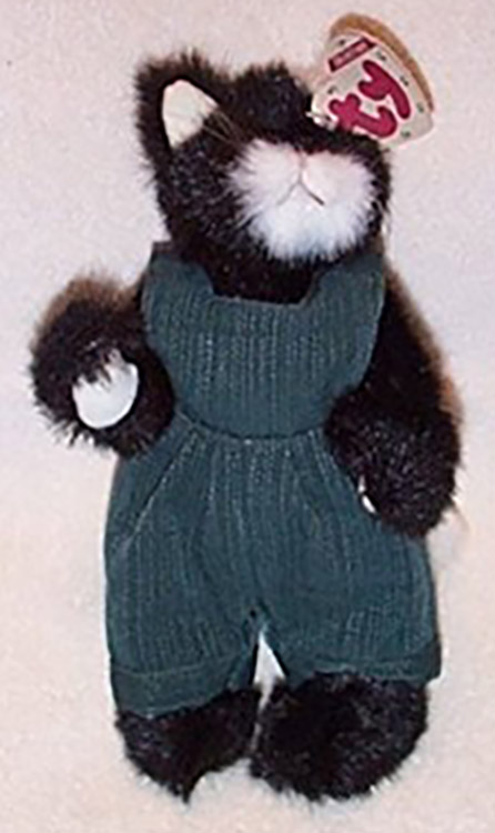 TY Attic Treasure Purrcy Black & White Cat in Teal Overalls
- introduced in 1995 and retired on 5/22/00
- Fully jointed plush black and white kitty cat
- She is wearing a teal denim overalls.