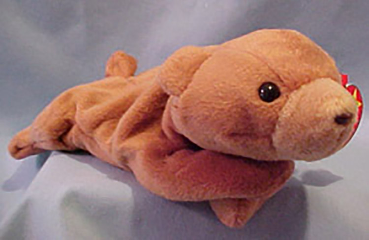 TY Beanie Babies Cubbie the Bear Stuffed Animal TY Beanie Babies Cubbie the Bear Stuffed Animal
- Introduced 1/08/94 retired 12/31/97
- Birth 11/14/93
- Poem: "Cubbie used to eat crackers and honey, And what happened to him was funny, He was stung by fourteen bees, Now Cubbie eats broccoli and cheese!"