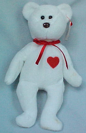 TY Beanie Baby Valentino the With Bear w/Red Heart TY Beanie Baby Valentino the With Bear w/Red Heart
- Introduced 1/7/95 retired 12/31/98
- Birth 2/14/94
- Poem: His heart is red and full of love, He cares for you so give him a hug, Keep him close when feeling blue, Feel the love he has for you!