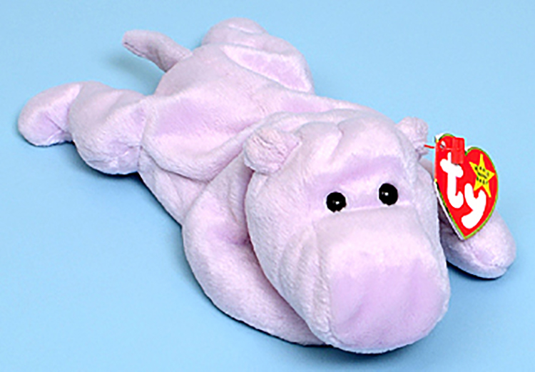 TY Beanie Babies Happy the Lavendar Hippo Stuffed Animal TY Beanie Babies Happy the Lavendar Hippo Stuffed Animal
- Introduced 6/3/95 retired 5/1/98
- DOB 2/25/94
- Poem: "Happy the Hippo loves to wade, In the river and in the shade, When Happy shoots water out of his snout, You know he's happy without a doubt!"