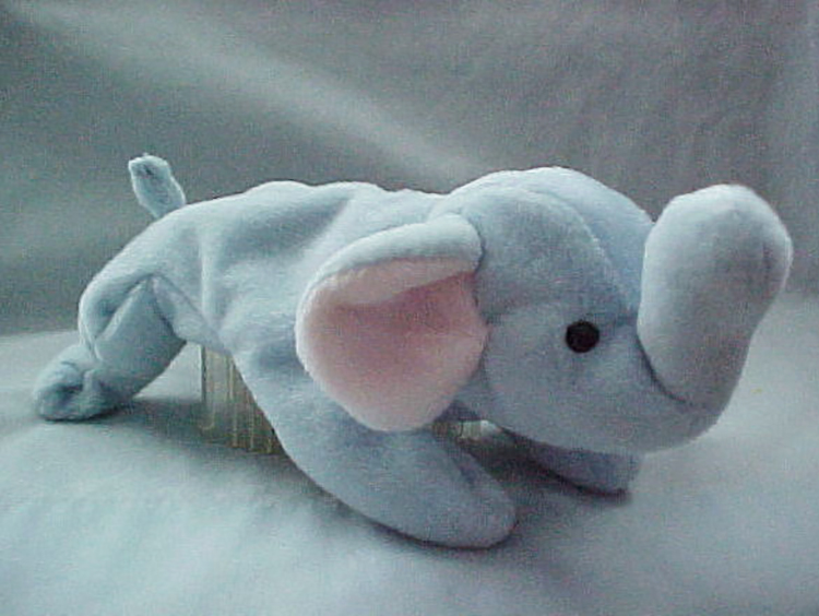 TY Beanie Babies Peanut the Light Blue Elephant Stuffed Animal TY Beanie Babies Peanut the Light Blue Elephant Stuffed Animal
- Introduced 10/1/95 retired 5/1/98
- DOB 1/25/95
- Poem: "Peanut the elephant walks on tip-toes, Quietly sneaking wherever she goes, She'll sneak up on you and a hug, You will get, Peanut is a friend you won't soon forget!"
