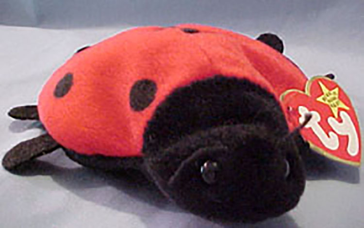 TY Beanie Babies Lucky the Lady Bug 11 spot TY Beanie Babies Lucky the Lady Bug 11 spot
- Introduced 2/27/96 retired 5/1/98
- DOB 5/1/95
- Poem: "Lucky the lady bug loves the lotto, Someone must win that's her motto, But save your dimes and even a penny, Don't spend on the lotto and You'll have many!"
