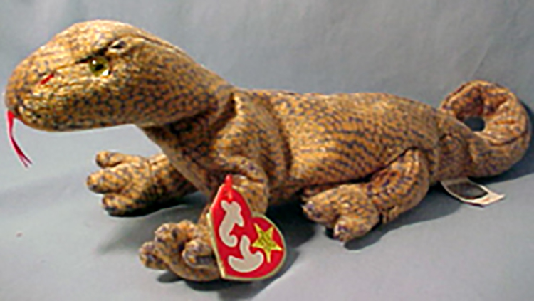 TY Beanie Babies Scaly the Lizard Stuffed Animal TY Beanie Babies Scaly the Lizard Stuffed Animal
- Introduced 8/31/99 retired 12/23/99
- DOB 2/9/99
- Poem: "I love to lie, basking in the sun, Living in the desert sure is fun, Climbing up cactus, avoiding a spike, I'm the Beanie you're sure to like!"