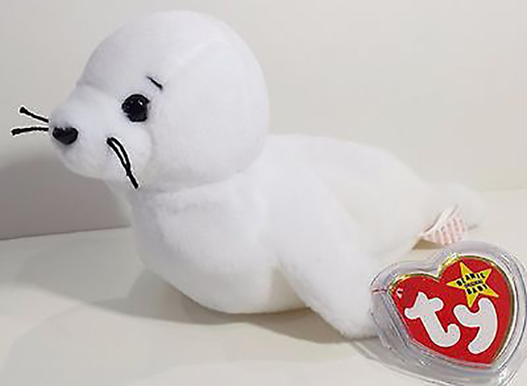 TY Beanie Babies Seamore the Seal Stuffed Animal TY Beanie Babies Seamore the Seal Stuffed Animal
- Introduced 6/25/94 retired 10/1/97
- DOB 12/14/96
- Poem: "Seamore is a little white seal, Fish and clams are her favorite meal, Playing and laughing in the sand, She's the happiest seal in the land!"